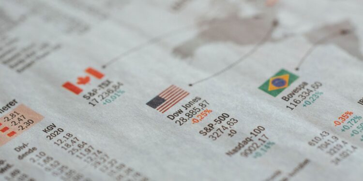 Gazete sayfasında yer alan Dow Jones ve S&P gibi borsa verileri.